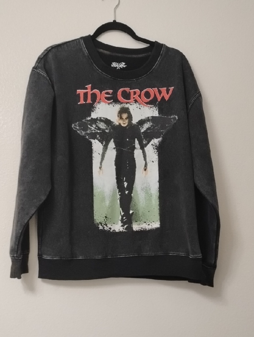 The Row Black Crewneck with White Logo and Red Hem Graphic
